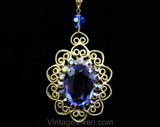 Victorian Revival Pendant Necklace - Bold Blue Antique Style Gold Hue Metal Medallion - Faceted Glass Rhinestones & Filigree - 1970s Retro