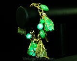 Terrific 1960s Green Charm Bracelet - Cage Style Beads & Jade Plastic Baubles - Goldtone Metal - Secretary Style - Chunky Metal 60s Fad