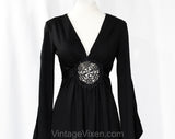 Size 6 Hippie Black Dress - Bohemian 70s Polyester Knit with Peek A Boo Bare Midriff Waist Medallion - Slit Long Angel Sleeve - Bust 33.5