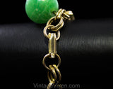 Terrific 1960s Green Charm Bracelet - Cage Style Beads & Jade Plastic Baubles - Goldtone Metal - Secretary Style - Chunky Metal 60s Fad