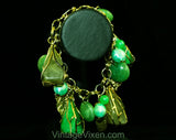 Terrific 1960s Green Charm Bracelet - Cage Style Beads & Jade Plastic Baubles - Goldtone Metal - Secretary Style - Chunky Metal 60s Fad