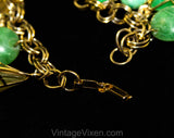 Terrific 1960s Green Charm Bracelet - Cage Style Beads & Jade Plastic Baubles - Goldtone Metal - Secretary Style - Chunky Metal 60s Fad