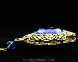 Victorian Revival Pendant Necklace - Bold Blue Antique Style Gold Hue Metal Medallion - Faceted Glass Rhinestones & Filigree - 1970s Retro