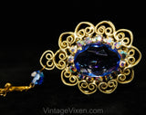 Victorian Revival Pendant Necklace - Bold Blue Antique Style Gold Hue Metal Medallion - Faceted Glass Rhinestones & Filigree - 1970s Retro